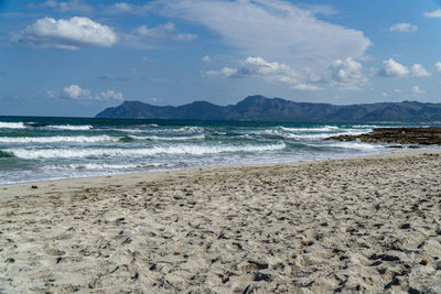 Scenic view of beach against sky