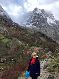 Woman standing on mountain landscape