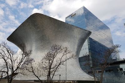 Low angle view of modern building against sky