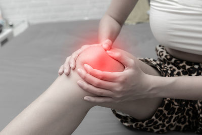 Close-up of woman holding hands