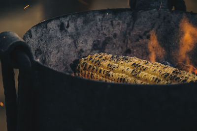 Close-up of meat on barbecue grill