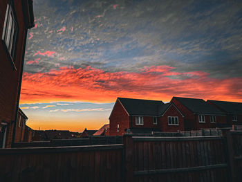 Low angle view of building against sky during sunset