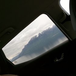 Close-up of airplane wing seen through window