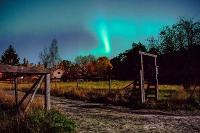 Scenic view of field against sky at night