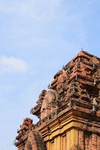 Low angle view of temple building against sky