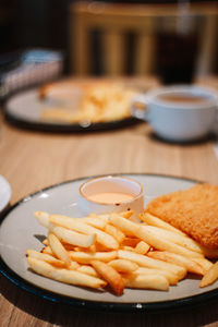 Close-up of food in plate on table