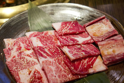 High angle view of meat in plate on table