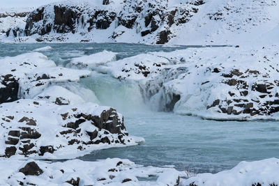 Panoramic image of the frozen waterfall urridafoss, iceland, europe