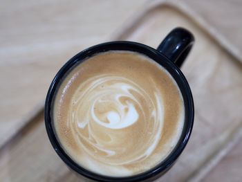 High angle view of cappuccino on table
