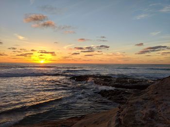 Scenic view of sea against sky during sunset