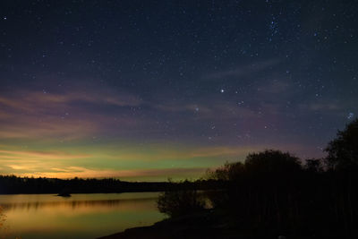 Scenic view of star field against sky at night