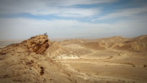 Scenic view of desert against sky