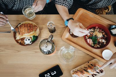 High angle view of woman having food