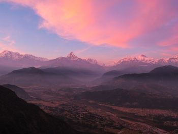 Scenic view of mountains against sky during sunset