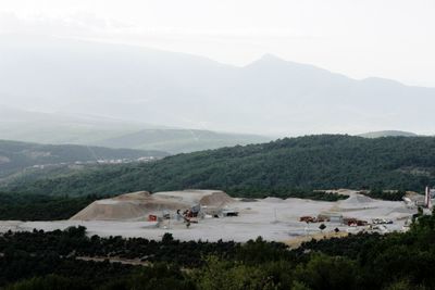 High angle view of landscape and mountains against sky