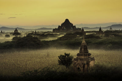 View of pagoda against sky during sunset