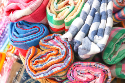 Full frame shot of rolled up towels at market stall