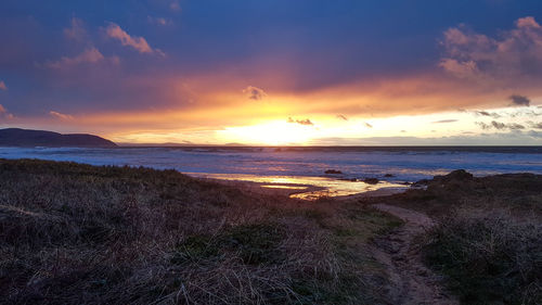 Scenic view of sea against sky during sunset