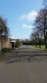 View of footpath along trees