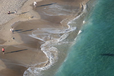 People enjoying at beach