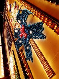 High angle view of illuminated lighting equipment on ceiling