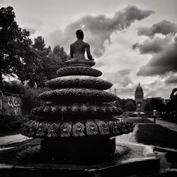 View of temple against cloudy sky