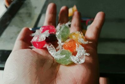 Close-up of hand holding ice cream