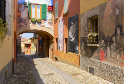 Alley amidst buildings in city