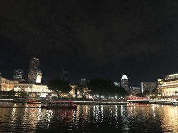 Illuminated buildings at waterfront