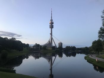 Reflection of communications tower in water