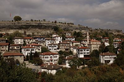 Buildings in city against sky