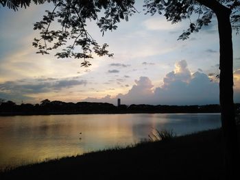 Scenic view of lake against sky during sunset