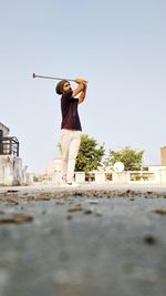Full length of man standing against sky