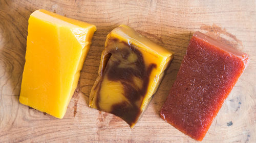 High angle view of lemon on cutting board