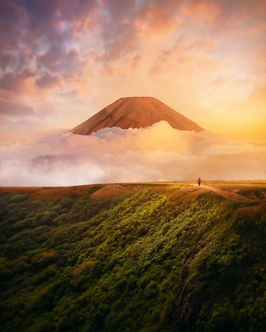 sky, scenics - nature, beauty in nature, cloud - sky, land, environment, landscape, sunset, tranquil scene, mountain, non-urban scene, tranquility, idyllic, nature, real people, travel, field, outdoors, one person, travel destinations, mountain peak