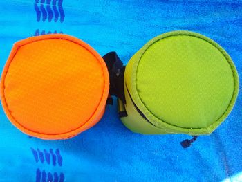 Close-up of yellow object against blue sky