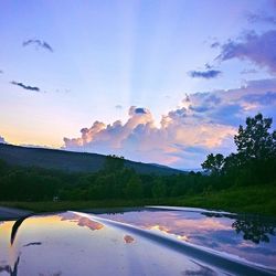 Scenic view of landscape against cloudy sky