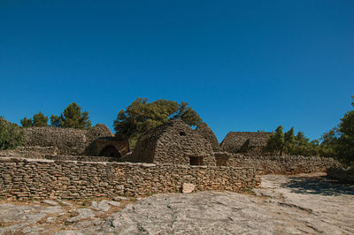 Typical hut made of stone at the village of bories, near gordes, in the french provence.