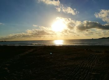 Scenic view of sea at sunset