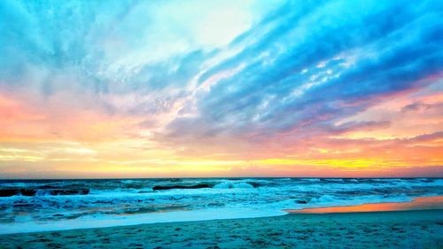 Scenic view of sea against sky during sunset