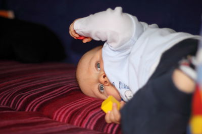 Close-up of baby toy on bed