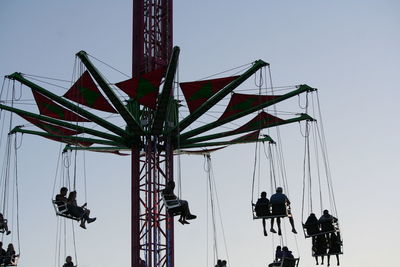 Low angle view of amusement park ride