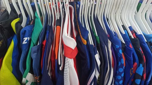 Full frame shot of multi colored sportswear in a rack