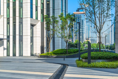 Street by buildings in city