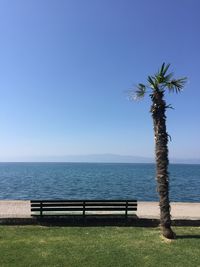 Scenic view of sea against clear blue sky