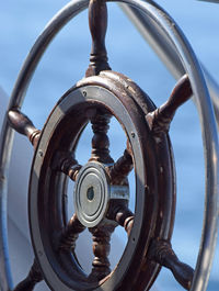 Close-up of steering wheel of boat