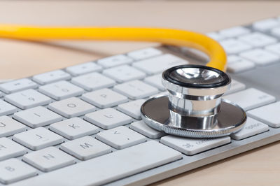 Close-up of laptop keyboard on table