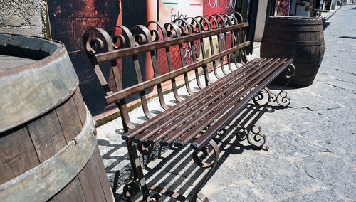 High angle view of empty bench on street