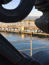 Boats moored at harbor