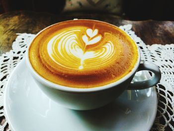 Close-up of cappuccino on table